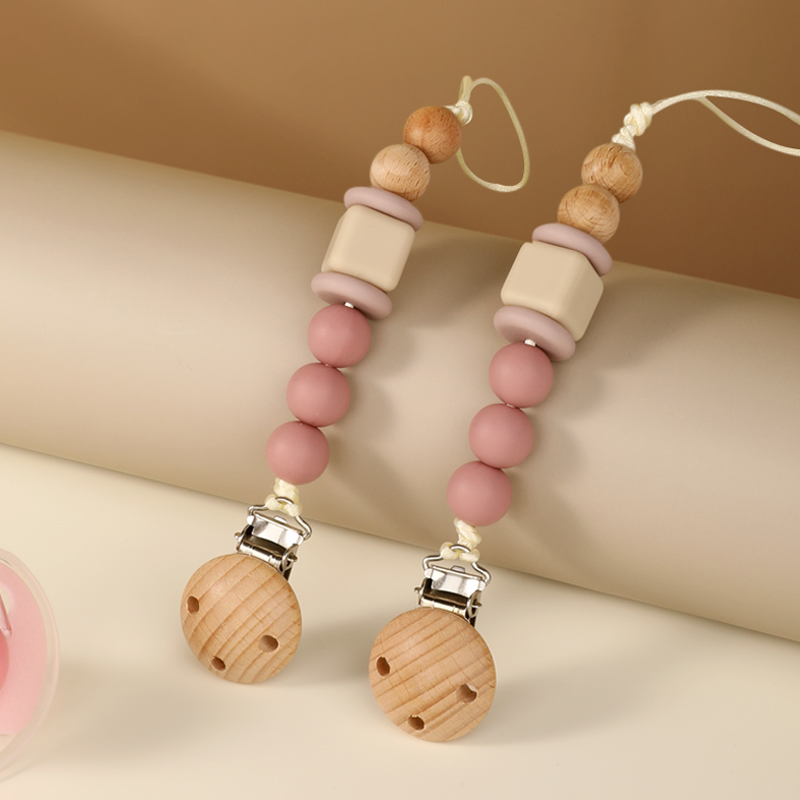 Pacifiers e cadeia de teethe de mole e ecologicamente correto